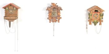 COLLECTION OF THREE VINTAGE 20TH CENTURY CUCKOO CLOCKS