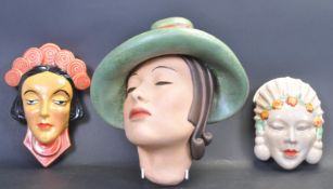 THREE ART DECO CERAMIC WALL PLAQUES