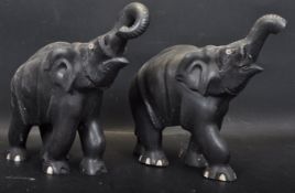 PAIR OF EARLY 20TH CENTURY EBONY ELEPHANTS