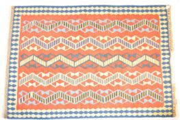 An early 20th century circa 1940’s Anatolian Kilim rug / carpet of a rectangular form decorated with