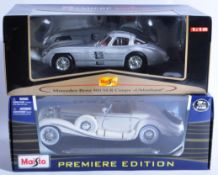 TWO MAISTO 1/18 SCALE PREMIER EDITION DIECAST MODEL CARS