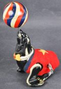 VINTAGE 1950S TINPLATE CLOCKWORK ACROBATIC SEAL WITH BALL