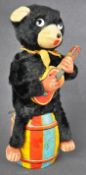 VINTAGE JAPANESE TINPLATE CLOCKWORK ' JOLLY GUITARIST ' TOY