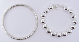 TWO SILVER BRACELETS