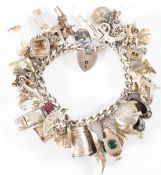 VINTAGE SILVER HALLMARKED CHARM BRACELET