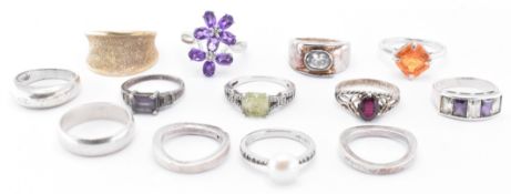 THIRTEEN SILVER RINGS INCLUDING STONE SET