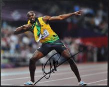 USAIN BOLT - SPRINTER - AUTOGRAPHED 8X10