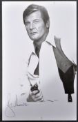 SIR ROGER MOORE (1927-2017) - JAMES BOND 007 - SIGNED PHOTOGRAPH