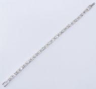 SILVER & TOPAZ TENNIS BRACELET