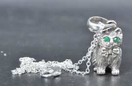 SILVER WHISTLE PENDANT IN THE FORM OF A CAT