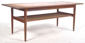DANISH TEAK COFFEE TABLE WITH RATTAN MAGAZINE UNDER TIER SHELF
