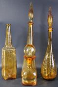 EMPOLI GLASS - COLLECTION OF FOUR AMBER COLOURED GENIE BOTTLES