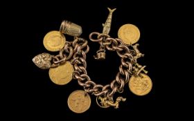 Edwardian Period - 9ct Gold Ornate Curb Bracelet Loaded with 9ct Gold Charms ( 7 ) and 22ct Gold