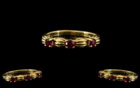 14ct Gold Attractive 3 Stone Ruby Set Ri