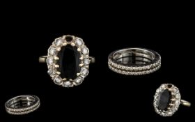 18ct White Gold Sapphire & Diamond Cluster Ring, together with an 18ct gold half eternity ring,