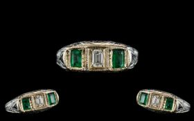 Antique Period - Attractive Platinum Pave Set 3 Stone Emerald and Diamond Dress Ring.