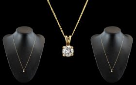 A Fine 18ct Gold Single Stone Diamond Set Pendant, Attached to a 9ct Gold Chain.