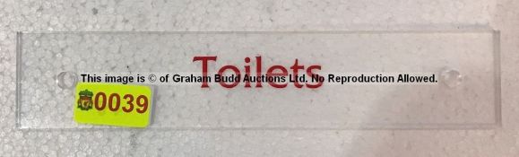 Clear acrylic TOILETS door sign from the Press Conference Room at Liverpool Football Club's