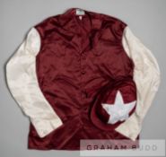 Racing colours of Sheikh Mohammed 1990s, maroon with white sleeves and star on cap, signed by the