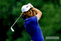 Tommy Fleetwood (ENG) signed Nike cap and action photo, cap his own sponsor and branding and photo