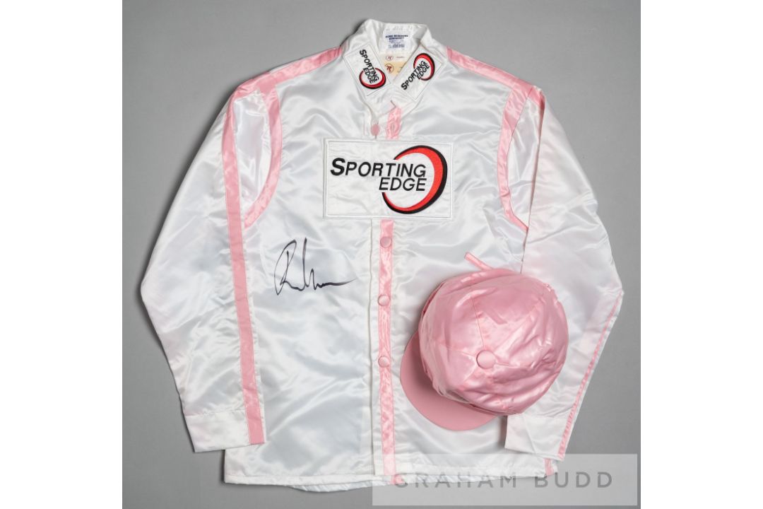 Racing colours of Lady Cecil signed by the jockey Ryan Moore circa 2013, white with pink seams and