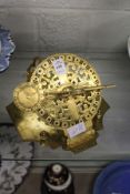 A reproduction brass equatorial sundial.