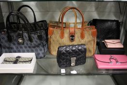 A good collection of ladies' handbags and purses.