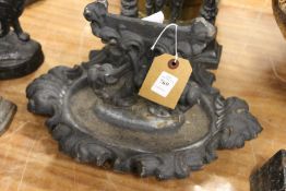 A cast iron boot scraper.