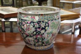 A large Chinese Famille Rose style fish bowl.