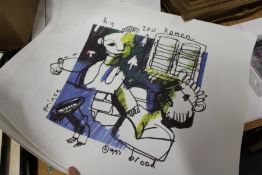 A small group of unframed posters.