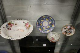 A Poole Pottery plate, a Dresden floral decorated bowl, an Imari style teapot stand and a floral