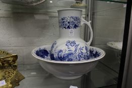 A blue and white jug and bowl.