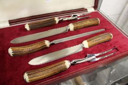 Asprey & Co, a cased five piece horn handled carving set.