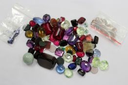 A group of mixed gemstones.