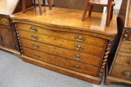 A good continental burr walnut four drawer chest with barley twist columns to each end.
