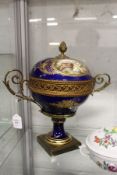 A continental porcelain and ormolu bowl and cover.