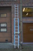 An aluminium extending ladder.