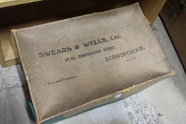 A bridal dress in an old box.