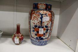 An Imari vase and a small Chinese bottle vase.