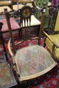 A good Edwardian inlaid mahogany armchair.