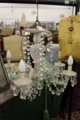 A Venetian style cut glass five branch chandelier.
