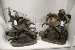 A large pair of spelter groups depicting huntsmen on horseback.