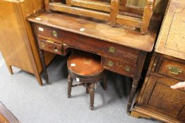 A 19th century mahogany kneehole side table.