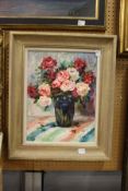 A colourful still life of flowers in a vase, oil on canvas.