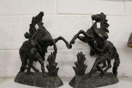 A pair of spelter figures of the Marley Horses.