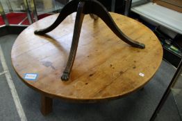 A good large pine circular coffee table.