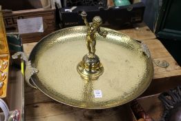 A decorative brass tazza.