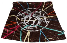 A ladies' silk head scarf.