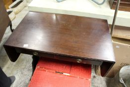 A reproduction mahogany sofa table.