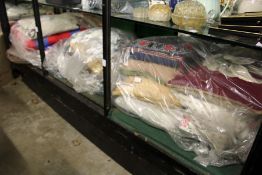 A good quantity of textiles to include patchwork quilts, cushions etc.